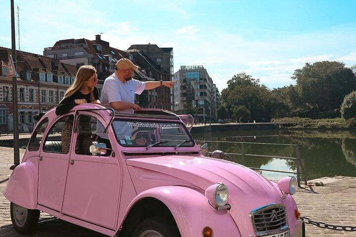 Visite privée d'1h00 en 2CV décapotable avec dégustation de produits régionaux