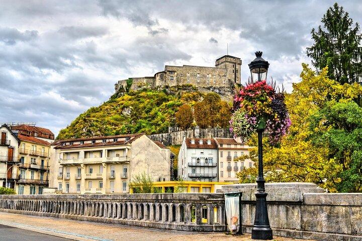 Explorez Lourdes en 60 minutes avec un Local