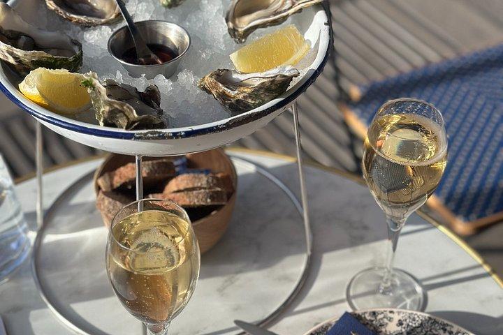 Tour de dégustation d'huîtres avec champagne et vin à Paris